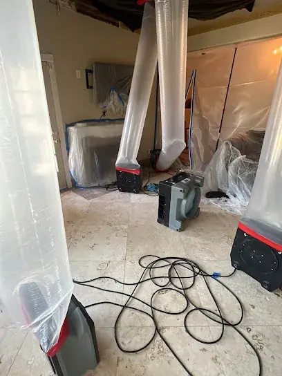 Air movers drying a room after a leak in a White Plains, NY home