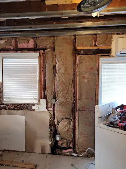 A basement wall dried after flooding in a White Plains, NY home