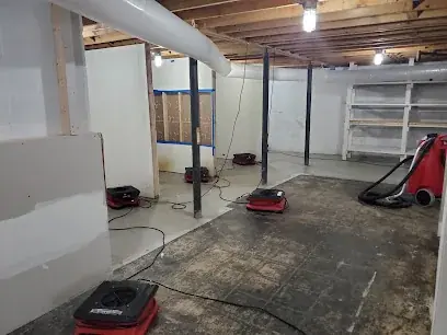 A flooded basement being cleaned in White Plains, NY